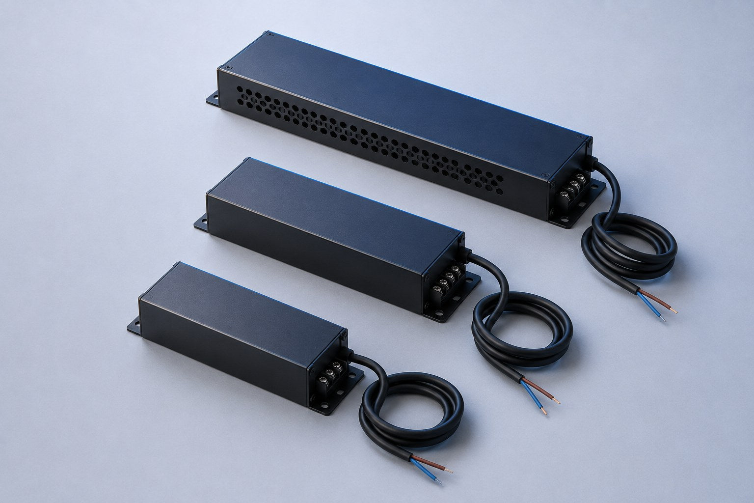 Three LED drivers of different sizes arranged in a row